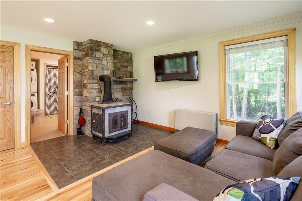 235 Grantwood Ridge Rome, ME 04963 - Photo 16 of 34 Living room with woodstove and...