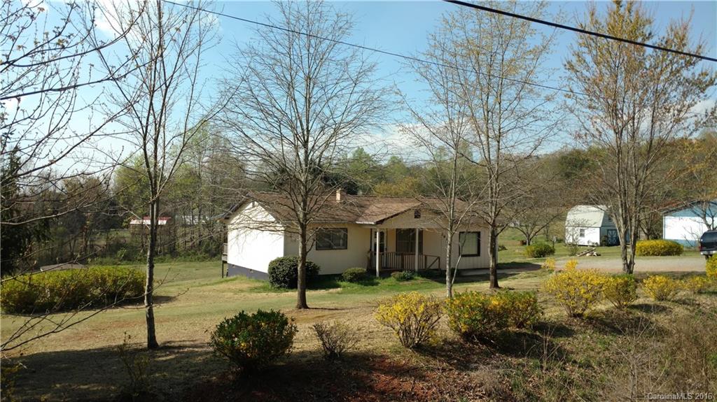 2936 Peniel Road Columbus, NC 28722 - Photo 4 of 4 a view of a house with a yard