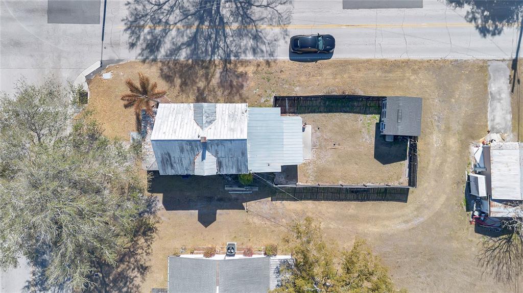 922 Delaware Avenue St. Cloud, FL 34769 - Photo 19 of 22 a bathroom with a sink and a mirror