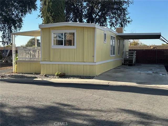 a front view of a house with garage