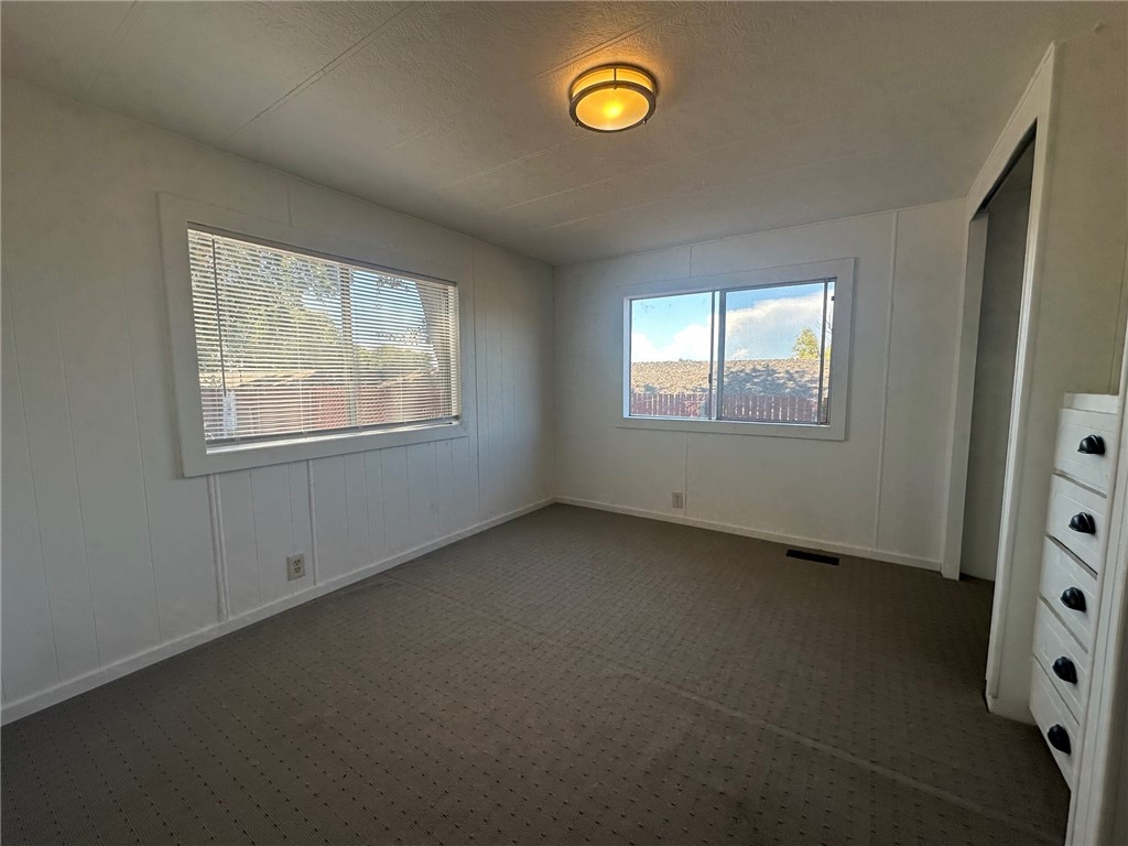 3549 Esplanade, Unit 402 Chico, CA 95973 - Photo 3 of 11 an empty room with windows