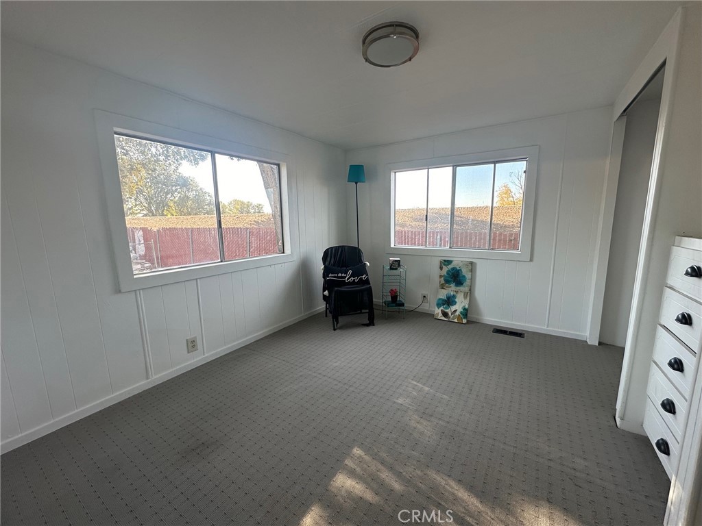 3549 Esplanade, Unit 402 Chico, CA 95973 - Photo 4 of 11 a room with window and a couch