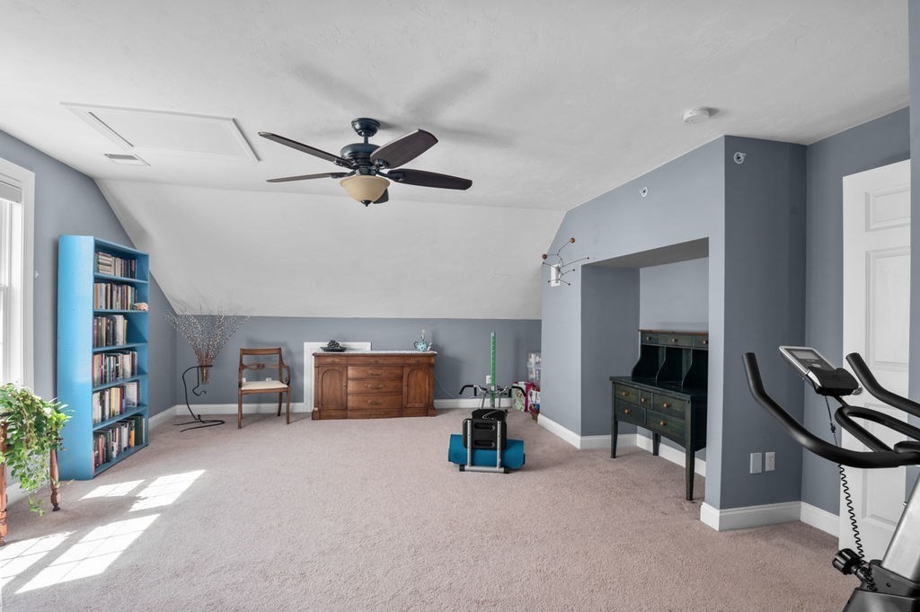 28 West Street, Unit 4A Ayer, MA 01432 - Photo 20 of 37 a living room with furniture and a flat screen tv