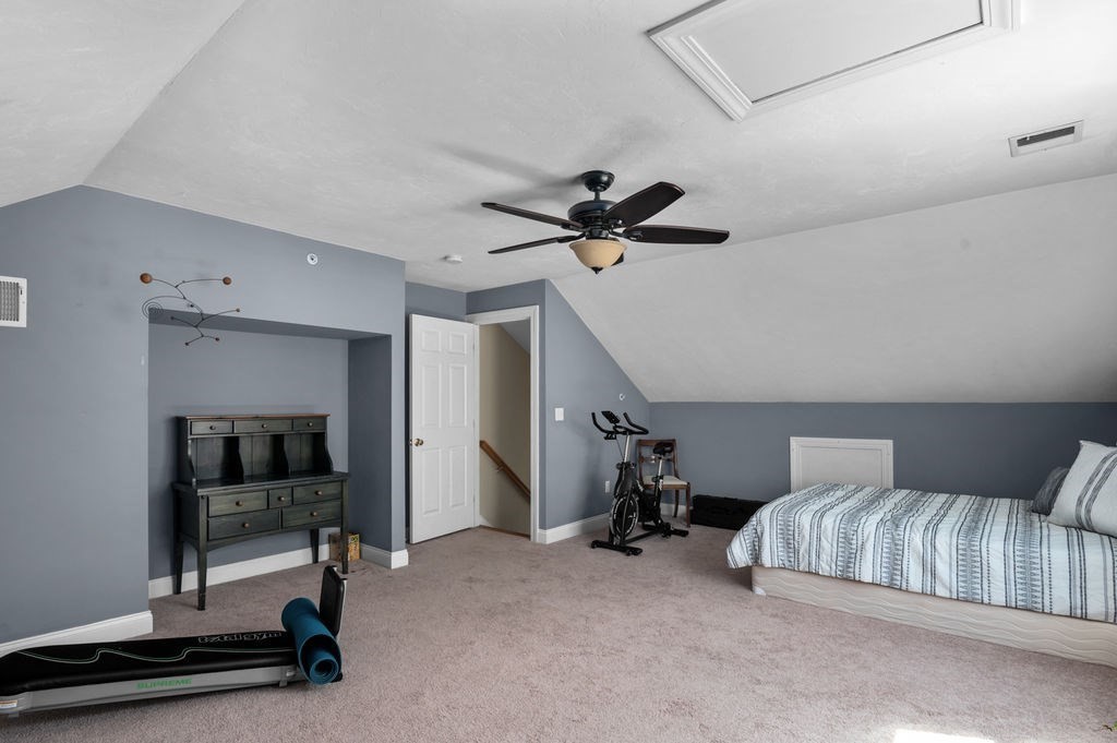 28 West Street, Unit 4A Ayer, MA 01432 - Photo 21 of 37 a living room with furniture and a ceiling fan
