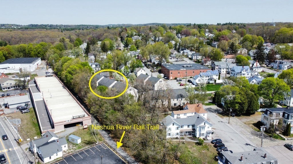 28 West Street, Unit 4A Ayer, MA 01432 - Photo 28 of 37 an aerial view of a house with a lake view