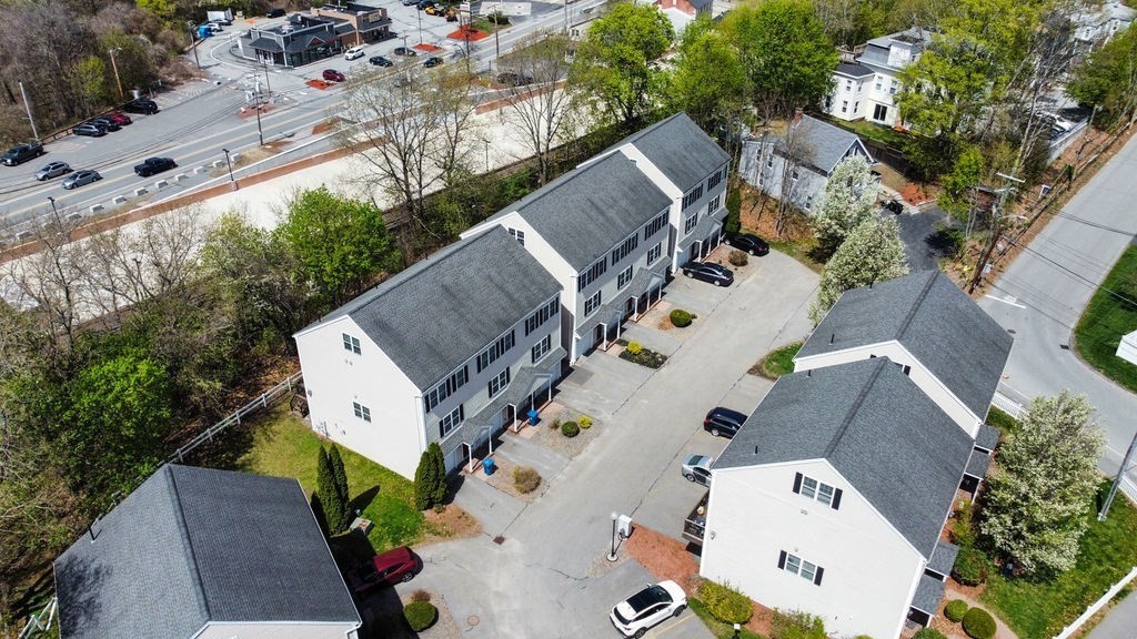 28 West Street, Unit 4A Ayer, MA 01432 - Photo 31 of 37 an aerial view of house with yard