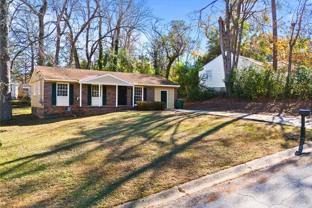 a view of a house with a swimming pool
