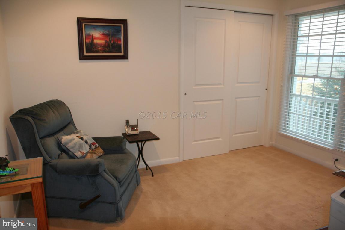 5607 Lone Pine Road Rhodesdale, MD 21659 - Photo 23 of 38 a living room with furniture and a window