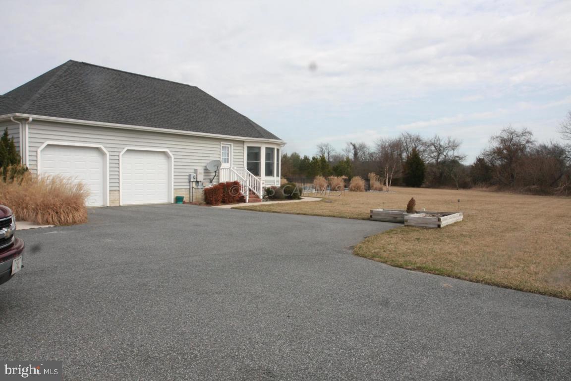 5607 Lone Pine Road Rhodesdale, MD 21659 - Photo 38 of 38 a view of a house with a outdoor space