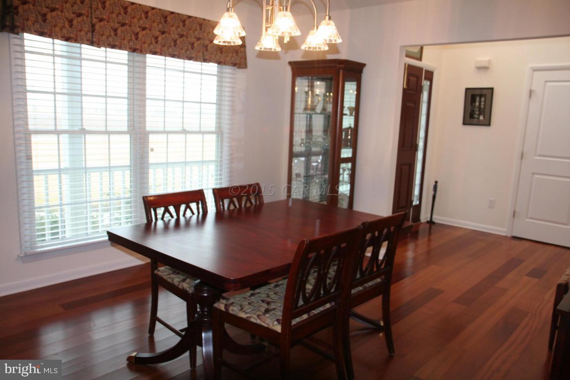 5607 Lone Pine Road Rhodesdale, MD 21659 - Photo 6 of 38 a view of a room with furniture window and wooden floor