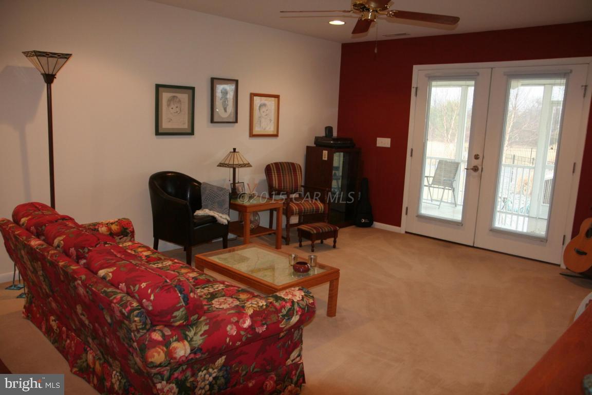 5607 Lone Pine Road Rhodesdale, MD 21659 - Photo 7 of 38 a bedroom with furniture and a window