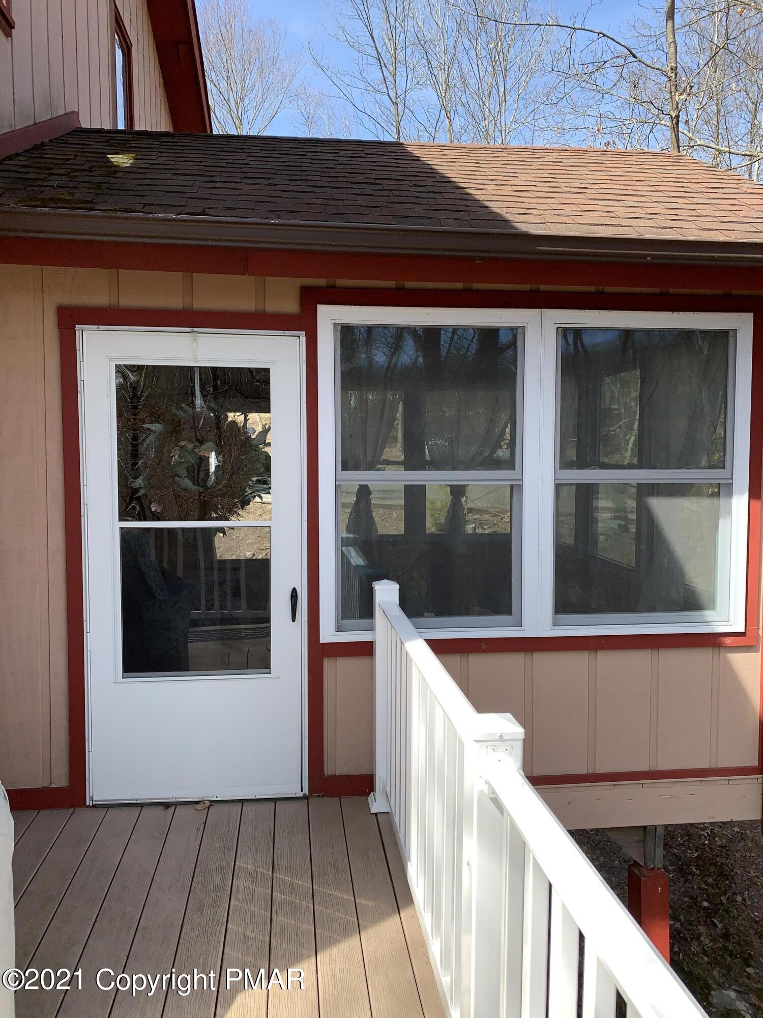 261 Kirkham Road Bushkill, PA 18324 - Photo 6 of 51 5-Florida Room Outside Rear