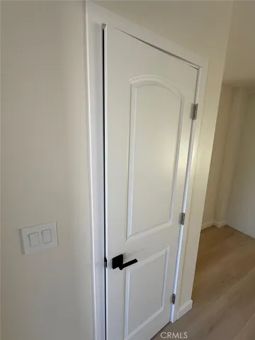 a large kitchen with kitchen island granite countertop a sink and cabinets