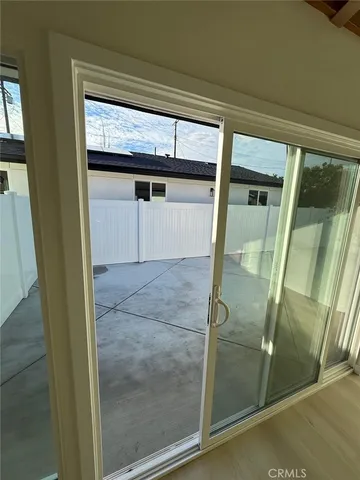 a view of a hallway view with wooden floor and staircase