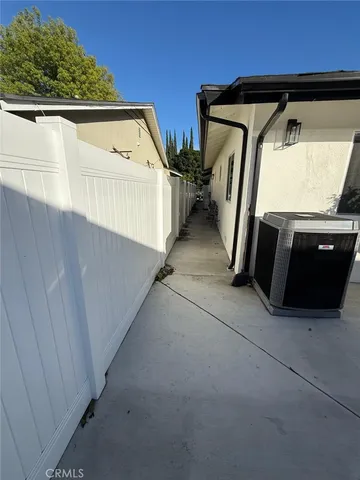 a view of hallway with walk in closet