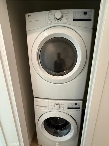 a bathroom with a double vanity sink toilet and shower