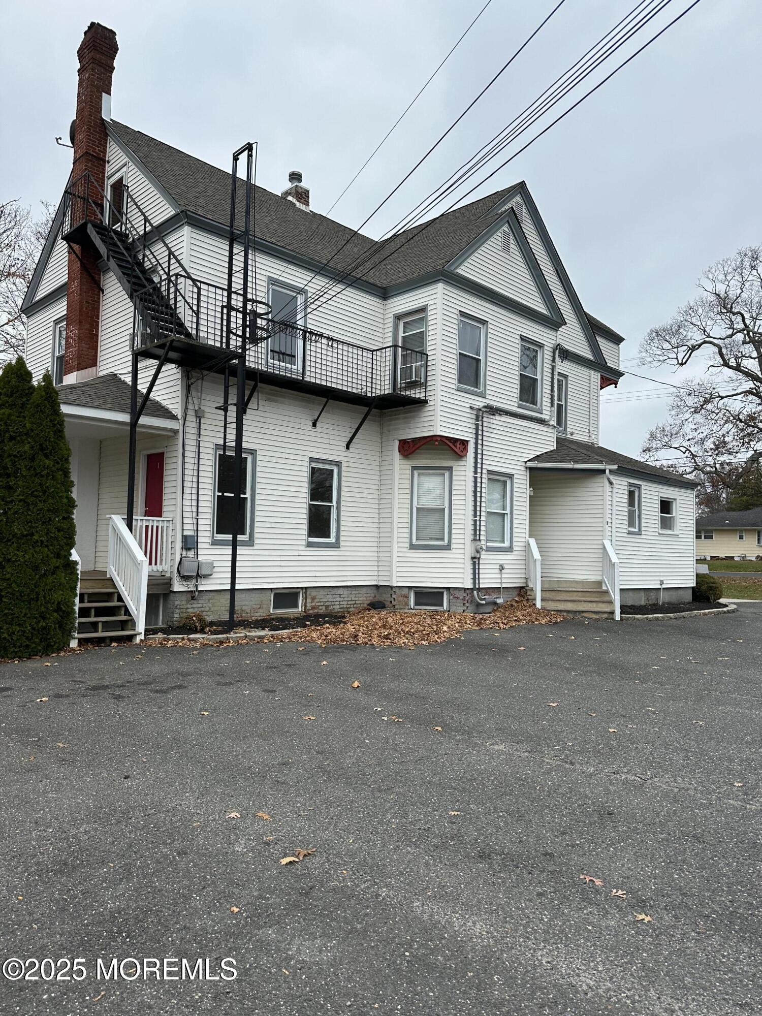 348 Cedar Avenue, Unit 3 Long Branch, NJ 07740 - Photo 2 of 9 a front view of a house with a street