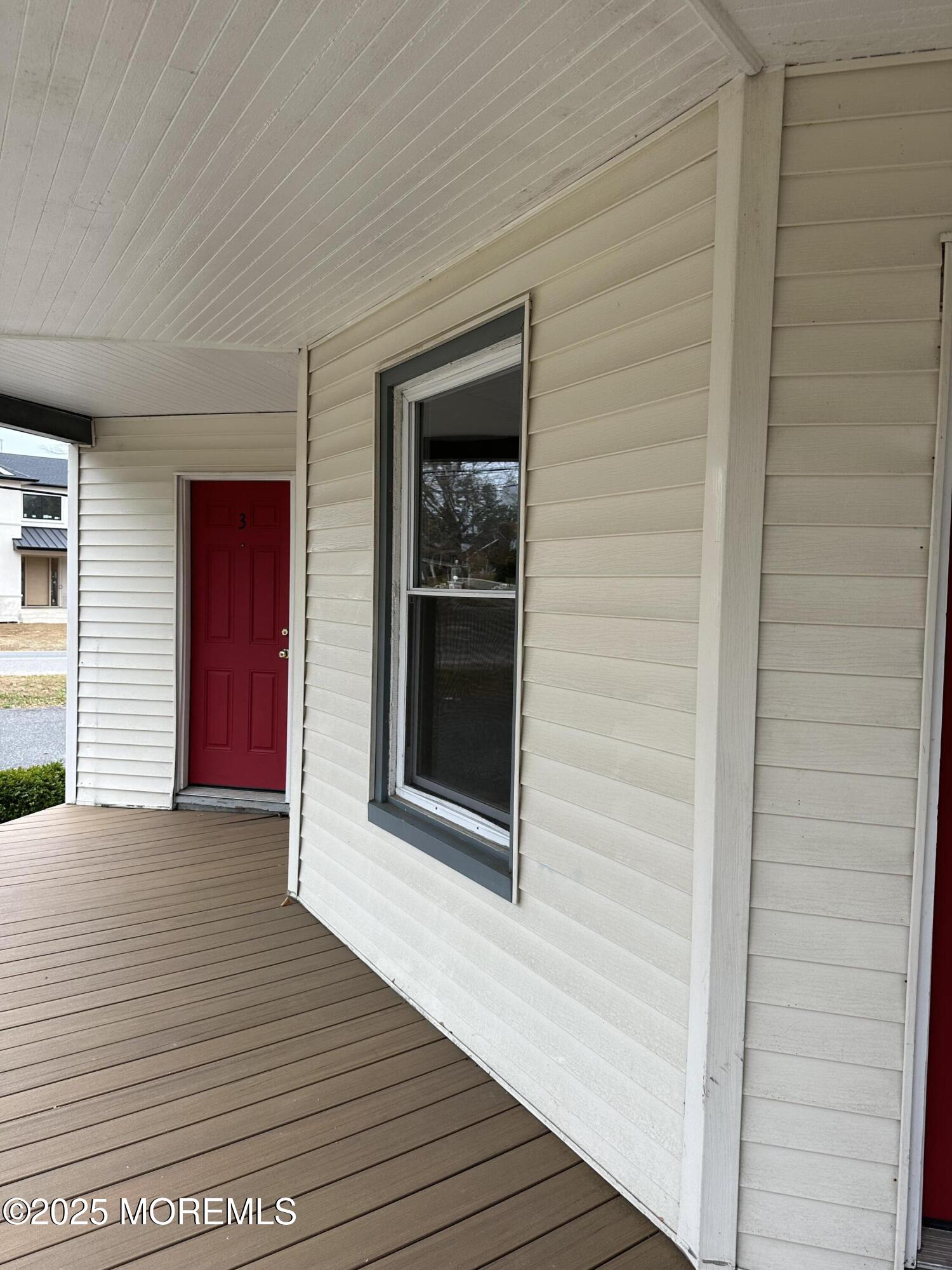 348 Cedar Avenue, Unit 3 Long Branch, NJ 07740 - Photo 9 of 9 a view of a wooden door and outdoor space