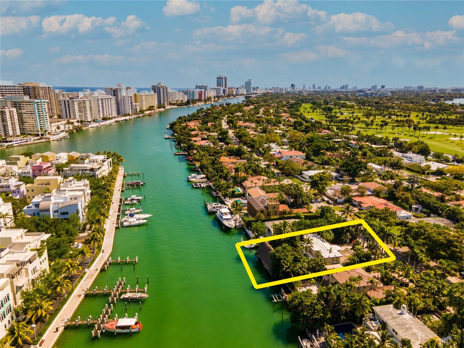 6145 Pine Tree Drive Miami Beach, FL 33140 - Photo 12 of 13 an aerial view of multiple house
