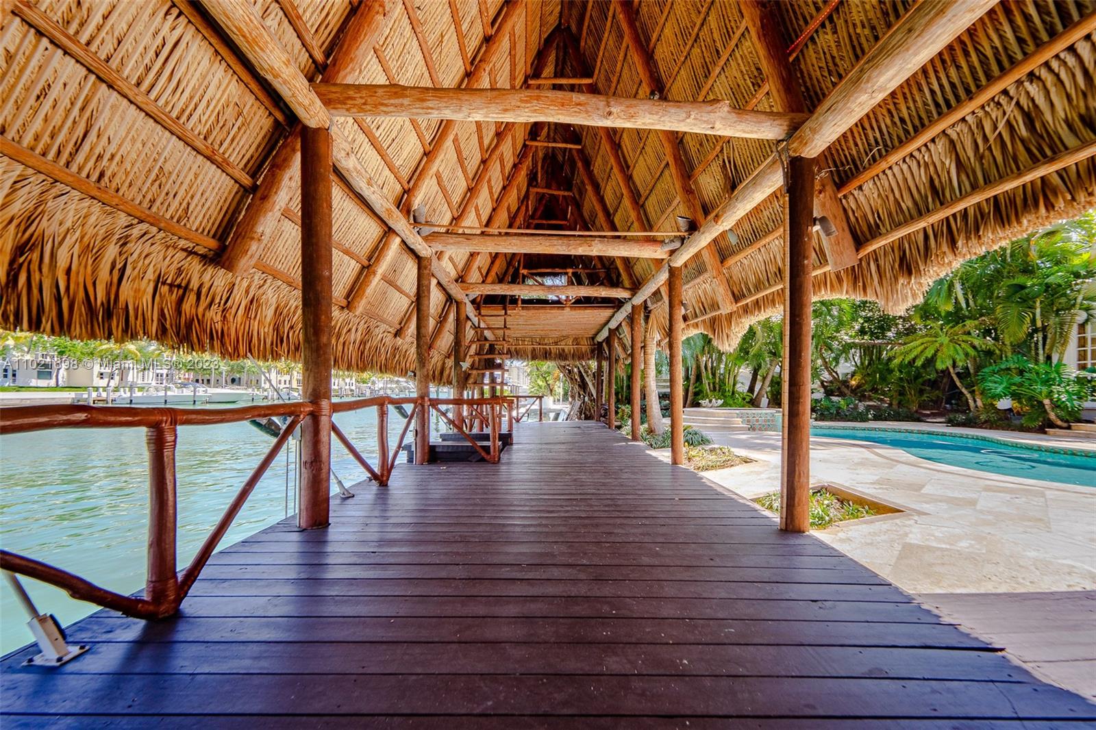 6145 Pine Tree Drive Miami Beach, FL 33140 - Photo 4 of 13 a view of outdoor space with seating