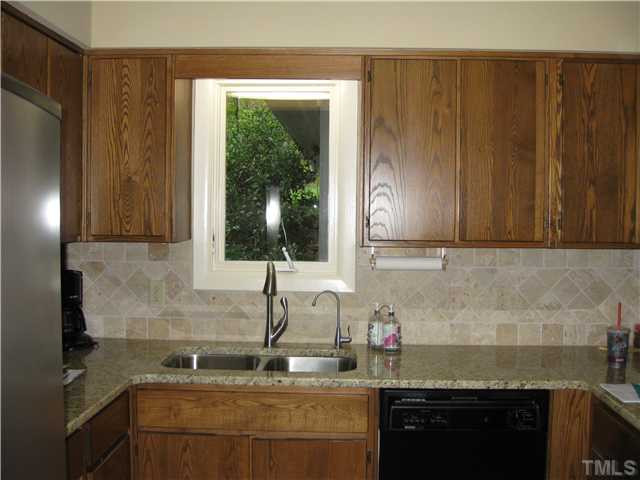 11929 Straight A Way Lane Raleigh, NC 27613 - Photo 9 of 20 Beautiful granite, stainless sink and backsplash Kitchen