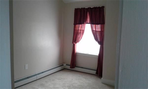 543 Jackson Street Fall River, MA 02721 - Photo 12 of 13 a view of a window in an empty room