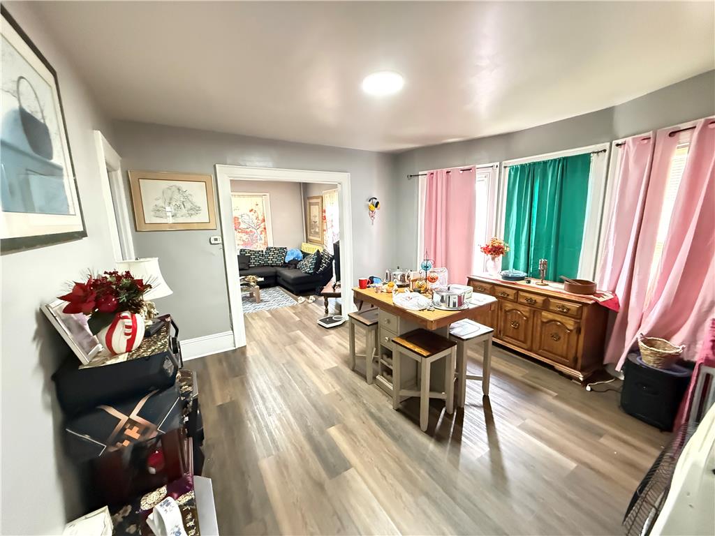 700 Philo Street Scranton, PA 18508 - Photo 6 of 19 Hardwood-style flooring and recessed lighting define this inviting dining area.