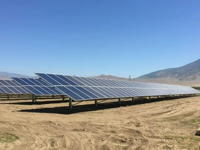 a view of room with wooden floor