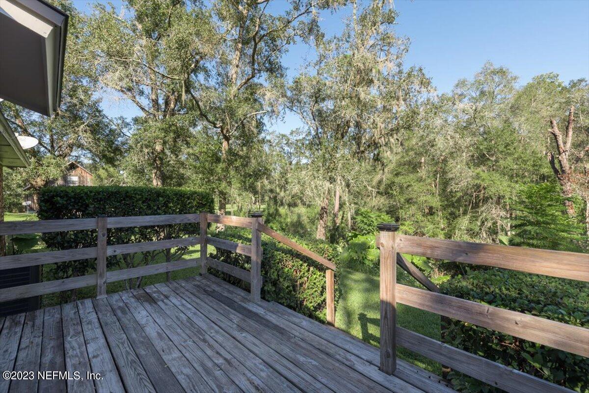 1575 Hardy Padgett Road Jacksonville, FL 32234 - Photo 23 of 43 a view of a balcony with wooden floor
