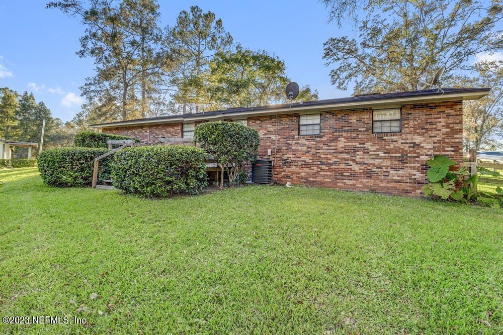 1575 Hardy Padgett Road Jacksonville, FL 32234 - Photo 31 of 43 a view of a backyard with plants