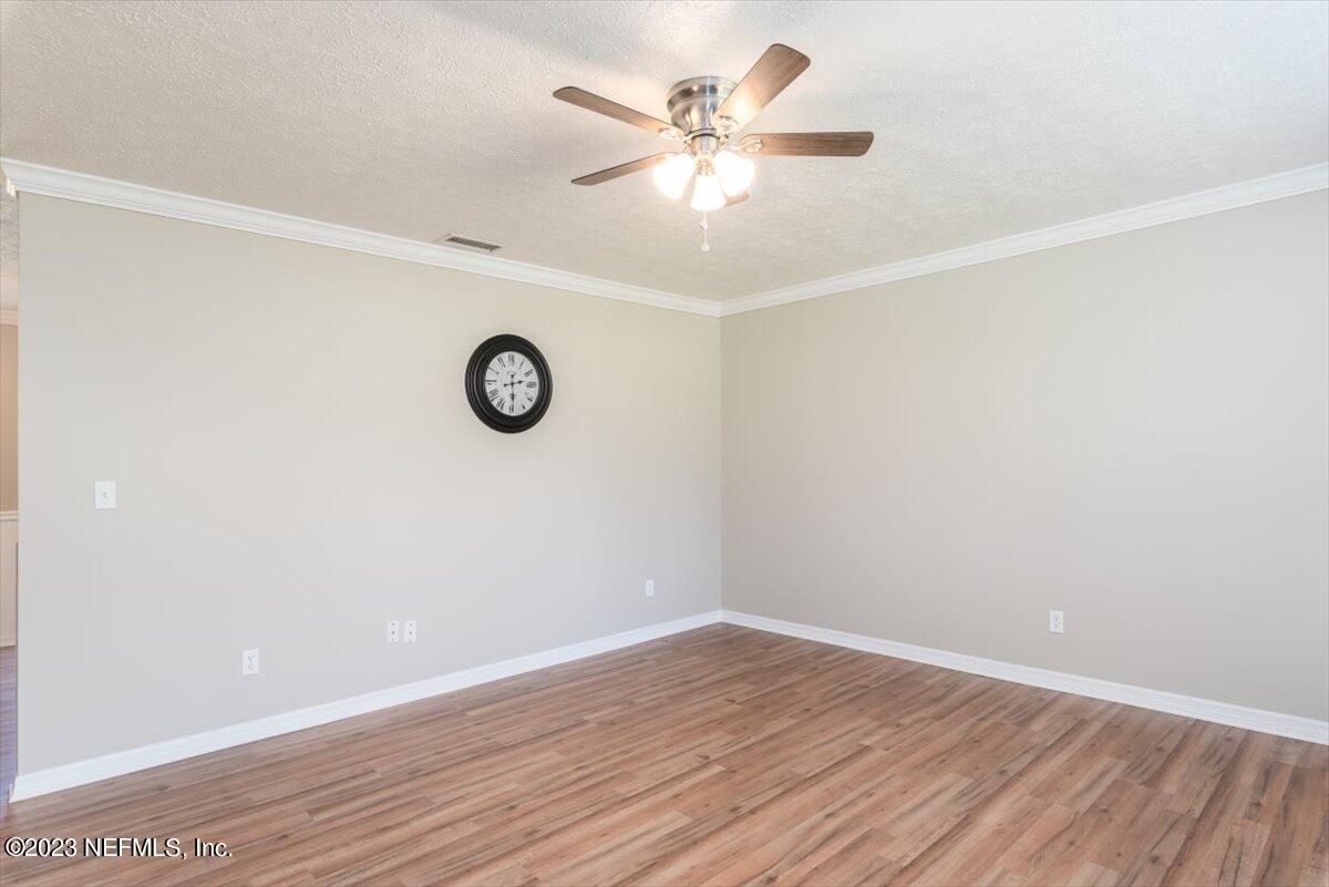 1575 Hardy Padgett Road Jacksonville, FL 32234 - Photo 8 of 43 a view of cabinets with wooden floor