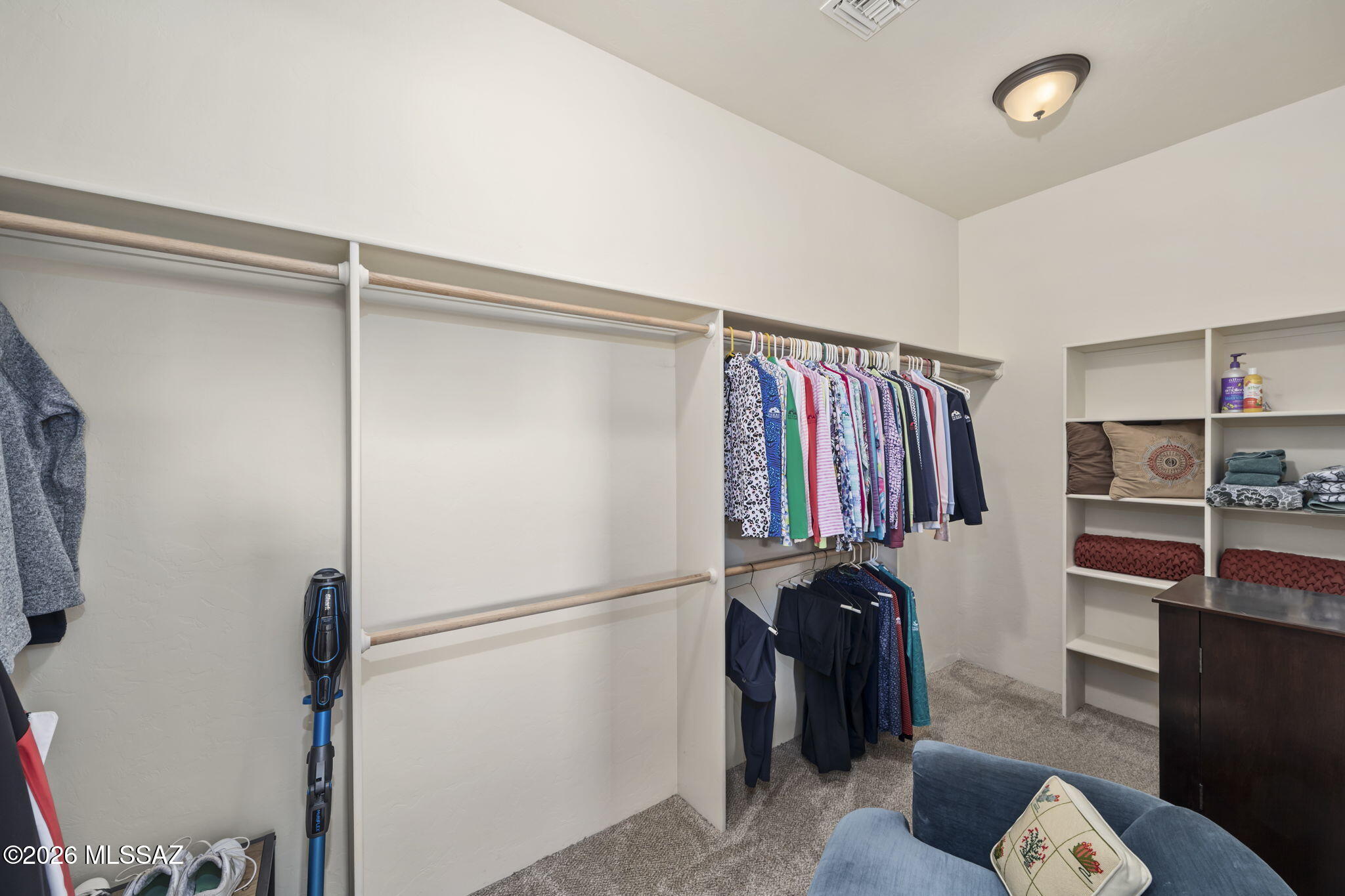 45 High View Court Tubac, AZ 85646 - Photo 27 of 44 a view of walk in closet with clothes and shoes