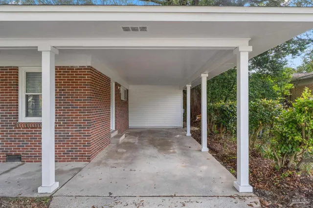 a view of backyard with green space