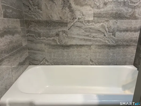 a bathroom with a bathtub