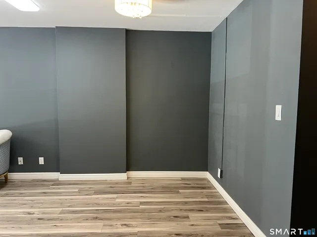 a view of lobby with a ceiling fan