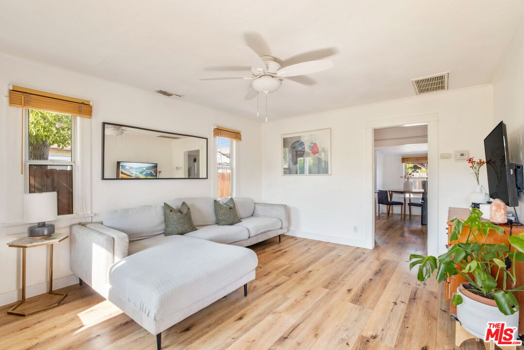 414 Raymond Drive Pasadena, CA 91107 - Photo 1 of 20 a living room with furniture and a wooden floor
