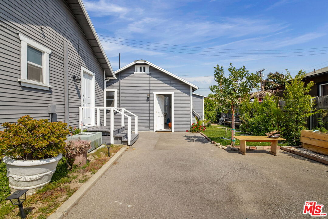 414 Raymond Drive Pasadena, CA 91107 - Photo 17 of 20 a view of a house with backyard and sitting area