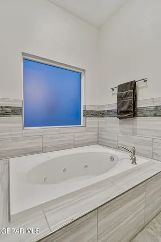 a bathroom with a sink and a bathtub