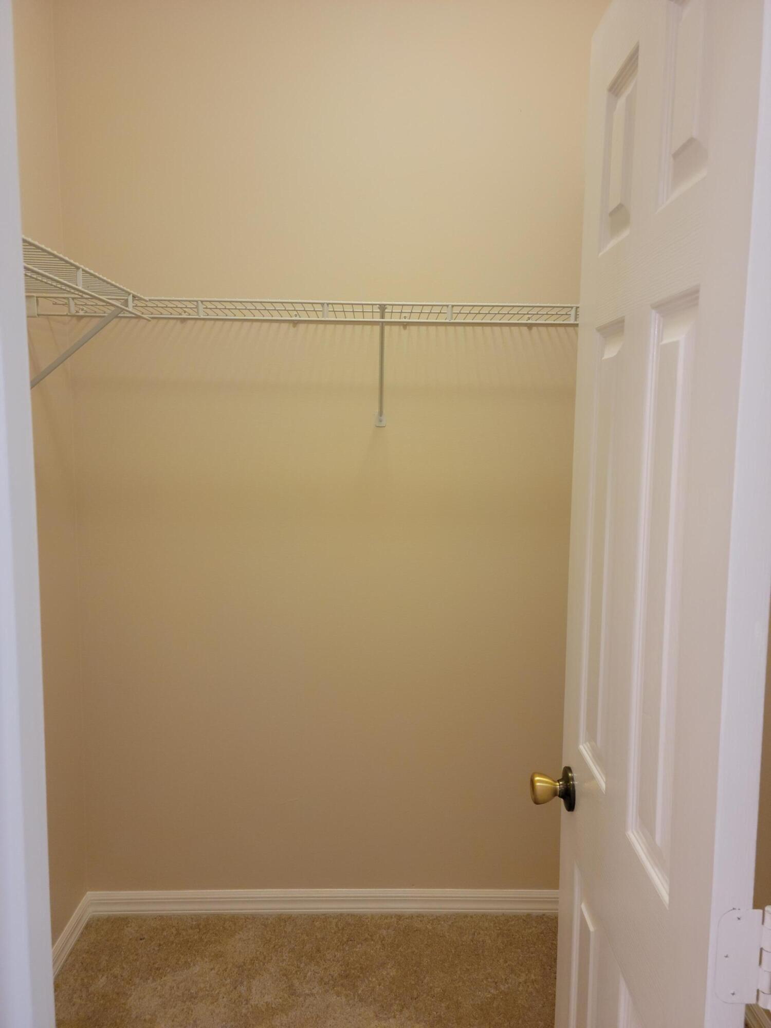 4013 Gator Trace Road Fort Pierce, FL 34982 - Photo 28 of 34 main walk in closet