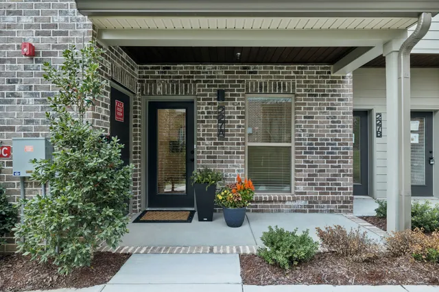 a front view of a house with a garage