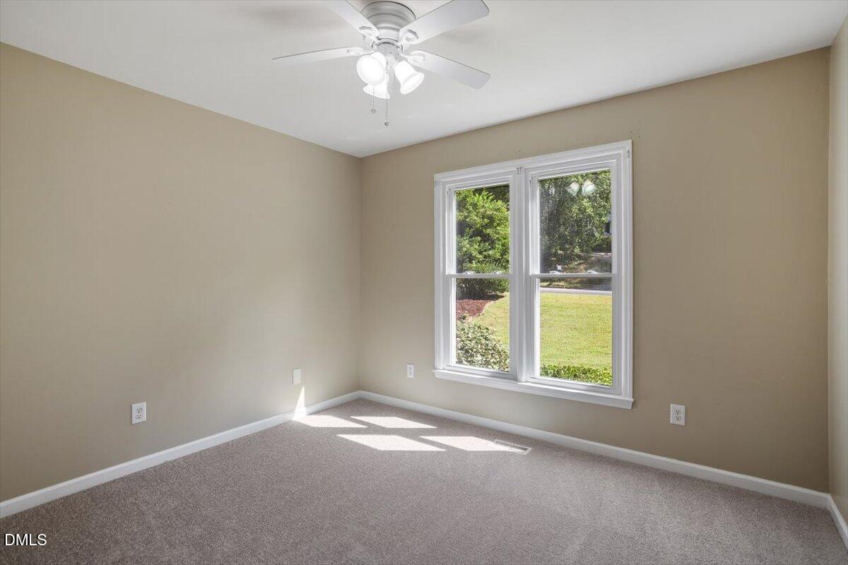 835 Madison Avenue Cary, NC 27513 - Photo 18 of 33 an empty room with a window
