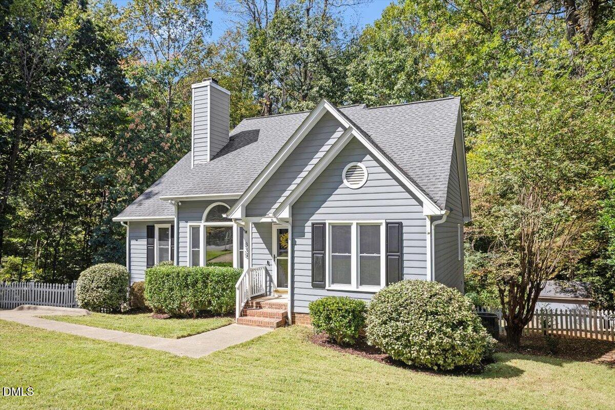835 Madison Avenue Cary, NC 27513 - Photo 2 of 33 a view of house with yard and sitting space