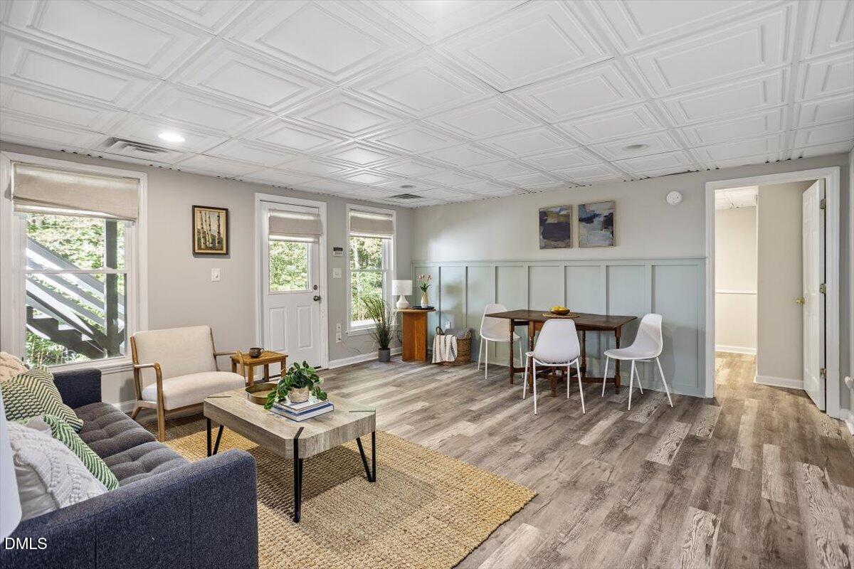 835 Madison Avenue Cary, NC 27513 - Photo 23 of 33 a living room with furniture and wooden floor