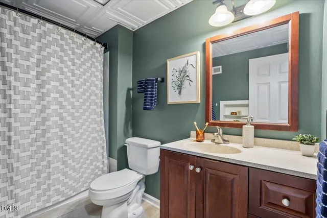 a view of a deck with wooden floor and fence