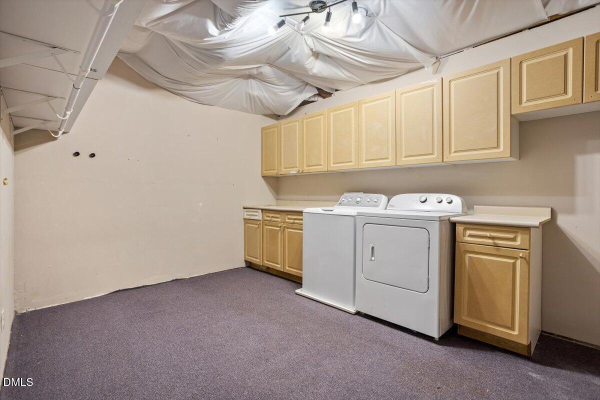 835 Madison Avenue Cary, NC 27513 - Photo 32 of 33 a utility room with dryer and washer
