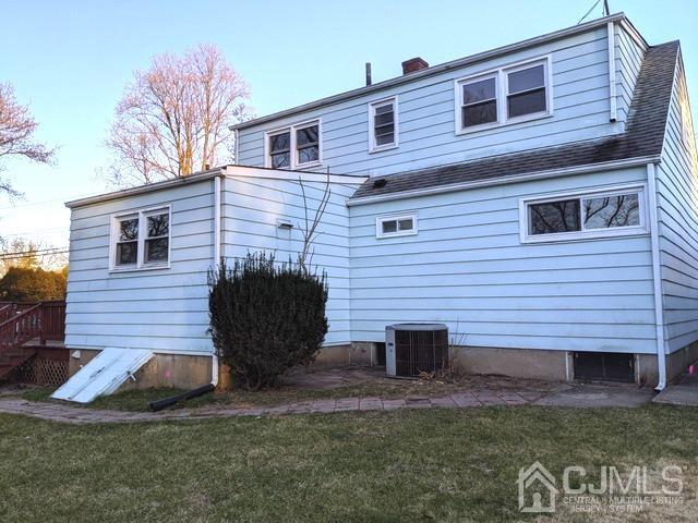 64 Tunison Road New Brunswick, NJ 08901 - Photo 3 of 21 a view of a backyard with plants and a barbeque