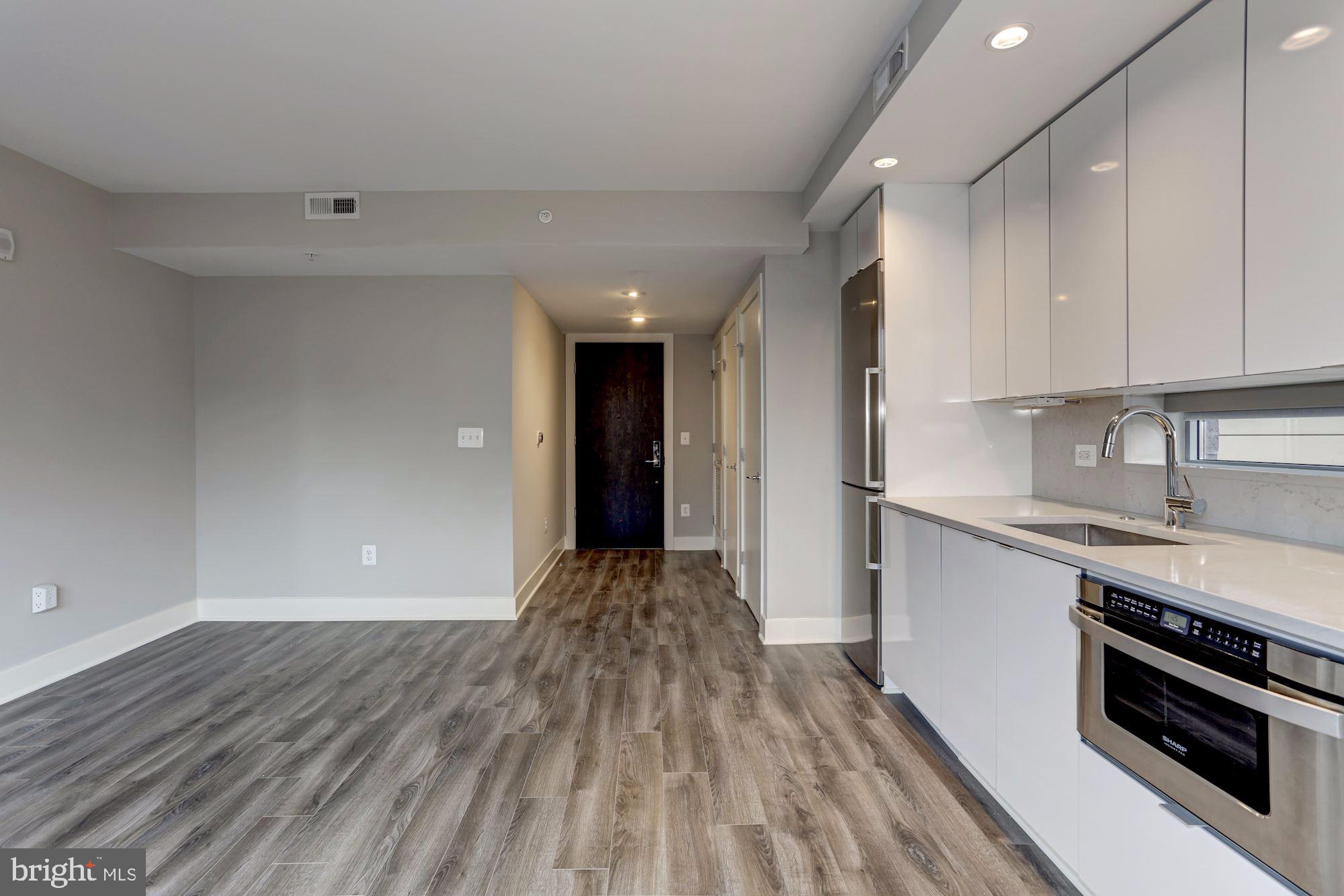 1311 13th Street Northwest, Unit 409 Washington, DC 20005 - Photo 14 of 48 Living/dining area