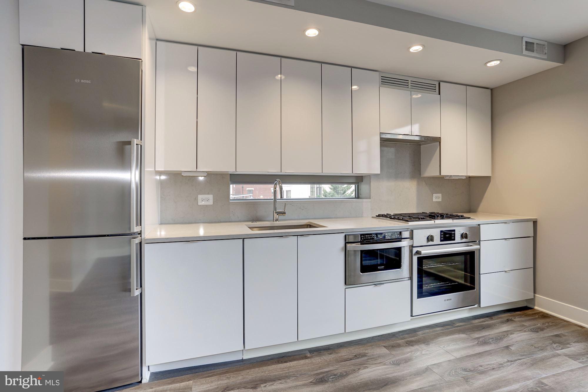 1311 13th Street Northwest, Unit 409 Washington, DC 20005 - Photo 15 of 48 Kitchen, Bosch appliances, gas cooking