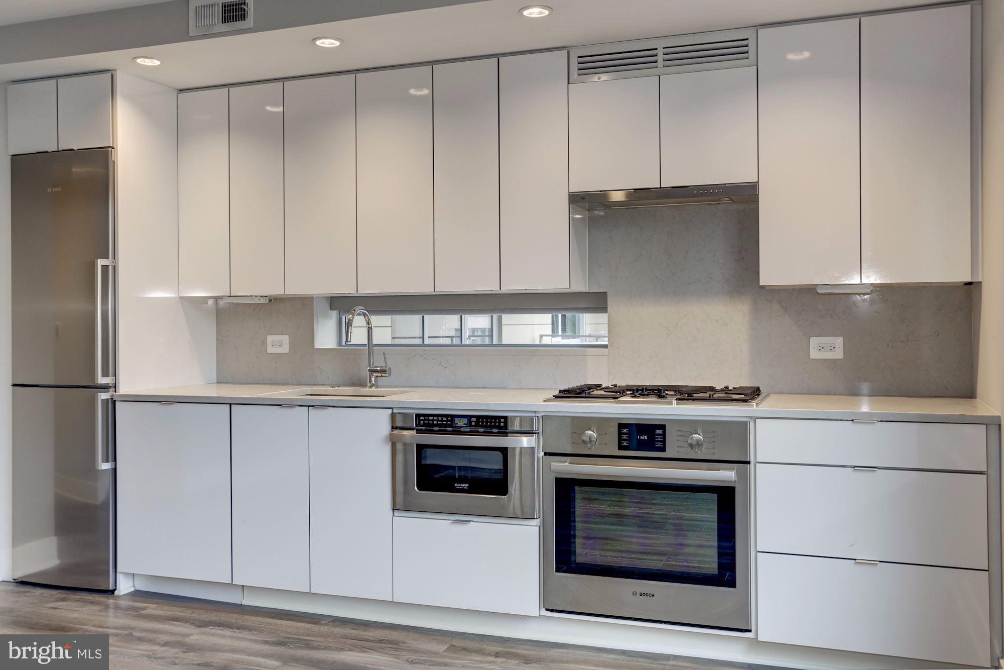 1311 13th Street Northwest, Unit 409 Washington, DC 20005 - Photo 17 of 48 Gas cooktop, Stainless steel appliances