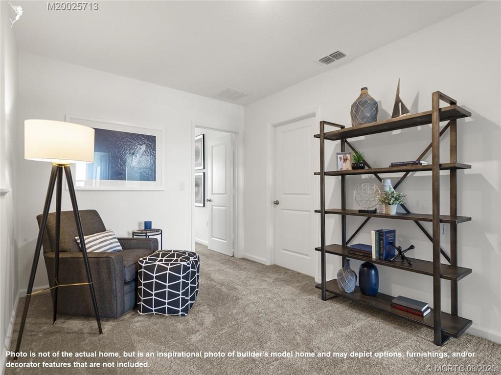 357 Southeast Angler Drive Stuart, FL 34994 - Photo 5 of 10 a living room with furniture